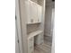 Efficient workspace with built-in desk, cabinets, and drawers for organized home office at 1263 Cicely Ct, North Port, FL 34289