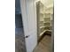 Pantry with open shelving, great for storage at 1263 Cicely Ct, North Port, FL 34289