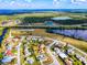 Scenic aerial view of a residential neighborhood near water with easy access to highway at 13575 Clara Ln, Port Charlotte, FL 33981