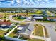 Beautiful aerial view of single Gathering homes in a quiet residential neighborhood at 13575 Clara Ln, Port Charlotte, FL 33981