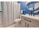 Stylish bathroom featuring a tiled shower, modern vanity, and updated fixtures at 13575 Clara Ln, Port Charlotte, FL 33981