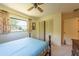 Bedroom with a bed, a window, and a dresser at 1497 Fireside St, Port Charlotte, FL 33952