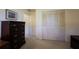 Bedroom with closet and dresser, showing plenty of room at 1497 Fireside St, Port Charlotte, FL 33952