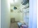 Walk-in closet with wire shelving offering ample storage space at 1497 Fireside St, Port Charlotte, FL 33952