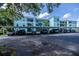 Exterior of condominium building with assigned covered parking at 19385 Water Oak Dr # 302, Port Charlotte, FL 33948
