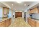 Large kitchen with a center island, custom cabinetry, and stainless steel appliances for a modern look at 200 Capri Isles Ct, Punta Gorda, FL 33950