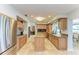 Well-designed kitchen with granite countertops, stainless steel appliances, custom cabinets, and tile flooring offers a welcoming space at 200 Capri Isles Ct, Punta Gorda, FL 33950