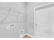 Laundry room featuring washer and dryer hookups and a storage shelf at 20241 Lorette Ave, Port Charlotte, FL 33954
