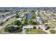 Waterfront community with homes nestled along canals and a scenic view of the bay at 21249 Higgs Dr, Port Charlotte, FL 33952