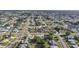 Wide aerial shot exhibiting a densely populated residential community with tree-lined streets at 21249 Higgs Dr, Port Charlotte, FL 33952