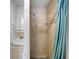 Small bathroom with a tiled shower stall, sink, and mirror at 21249 Higgs Dr, Port Charlotte, FL 33952