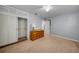 Bedroom with a closet, a dresser, neutral paint, and carpeting at 21249 Higgs Dr, Port Charlotte, FL 33952