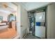 Functional laundry area with appliances and storage, conveniently located near the kitchen and living area at 21249 Higgs Dr, Port Charlotte, FL 33952