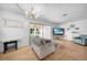 Comfortable living room with a sliding glass door leading to an enclosed patio at 21249 Higgs Dr, Port Charlotte, FL 33952