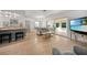 Cozy living space with a view of the enclosed lanai, perfect for relaxing at 21249 Higgs Dr, Port Charlotte, FL 33952