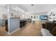 Bright and open living room with access to a screened-in patio and water view at 21249 Higgs Dr, Port Charlotte, FL 33952