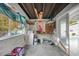 Spacious garage/storage area offering potential for workshop or additional storage solutions at 21249 Higgs Dr, Port Charlotte, FL 33952
