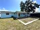 Inviting backyard featuring a covered patio, perfect for relaxation and outdoor enjoyment at 2600 Mohegan Rd, Venice, FL 34293