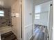 Hallway featuring access to the bathroom and bedroom at 2600 Mohegan Rd, Venice, FL 34293