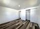 Bedroom featuring luxury vinyl flooring and a closet at 2600 Mohegan Rd, Venice, FL 34293