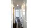 Hallway featuring luxury vinyl flooring at 2600 Mohegan Rd, Venice, FL 34293