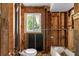 Bathroom undergoing renovation, highlighting natural light and plumbing features at 2677 Martin St, Sarasota, FL 34237