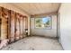 Incomplete bedroom with insulation and window, awaits personalized updates and design at 2677 Martin St, Sarasota, FL 34237