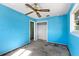 Bedroom with classic ceiling fan and natural light, ready for customization at 2677 Martin St, Sarasota, FL 34237