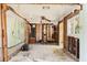 Bright and airy living room renovation project with tile floors and fan at 2677 Martin St, Sarasota, FL 34237