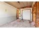 Unfinished room with insulation and a doorway, awaiting final touches at 2677 Martin St, Sarasota, FL 34237