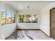 Sunroom with bare walls and six windows providing plenty of natural light at 2677 Martin St, Sarasota, FL 34237
