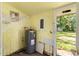 Utility room with a water heater, ready for improvements at 2677 Martin St, Sarasota, FL 34237