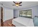 This bedroom has wood floors, closet and a sliding glass door at 29324 Leah Rd, Punta Gorda, FL 33982