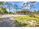Large carport area, ideal for boat or RV storage, providing covered parking and protection from the elements at 29324 Leah Rd, Punta Gorda, FL 33982