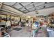 Spacious garage featuring a canoe, tools, and ample storage space at 29324 Leah Rd, Punta Gorda, FL 33982