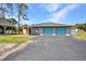 Detached two car garage and long driveway, providing ample parking space at 29324 Leah Rd, Punta Gorda, FL 33982