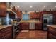 Modern kitchen with stainless steel appliances, granite countertops, and custom cabinetry, perfect for culinary enthusiasts at 29324 Leah Rd, Punta Gorda, FL 33982