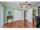 Office space boasts hardwood floors, neutral green walls, and ample closet storage at 29324 Leah Rd, Punta Gorda, FL 33982