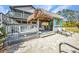 Backyard poolside tiki bar with seating and decor, offering a perfect spot for entertaining and relaxing at 29324 Leah Rd, Punta Gorda, FL 33982