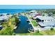 Aerial view of the property showing waterfront canal access with private dock and ocean access at 352 Oak St, Englewood, FL 34223