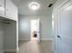 Bathroom leading to another room with vanity, sink, and natural lighting at 352 Oak St, Englewood, FL 34223