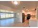 Modern kitchen featuring stainless steel appliances, quartz countertops, and an open floorplan at 352 Oak St, Englewood, FL 34223