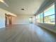 Spacious living room with tile floors, large windows providing natural light at 352 Oak St, Englewood, FL 34223