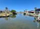 Scenic waterfront view of the canal with docks and homes at 352 Oak St, Englewood, FL 34223