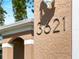 Close up detail of the house number 3621 on the exterior stucco wall at 3621 Jade St, North Port, FL 34288