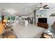 Open floor plan showing the kitchen, dining area, and living room with tile floors at 3621 Jade St, North Port, FL 34288