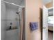Shower with bench and tile, offering a clean and contemporary design for relaxation and convenience at 3621 Jade St, North Port, FL 34288