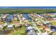 Picturesque aerial view of canal-front homes with boat docks in a coastal community at 3712 Carmichael Dr, Punta Gorda, FL 33950