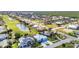 Vibrant community showcasing a golf course, lake, and meticulously maintained lawns at 3712 Carmichael Dr, Punta Gorda, FL 33950