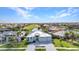 New construction home with a manicured lawn and golf course view at 3712 Carmichael Dr, Punta Gorda, FL 33950